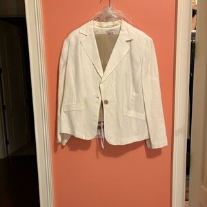 Isabella suits Cream Blazer and tan slacks.